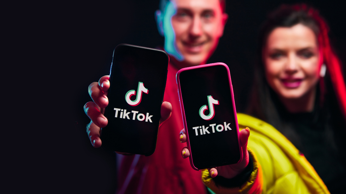 Smartphones displaying TikTok for social media accounting