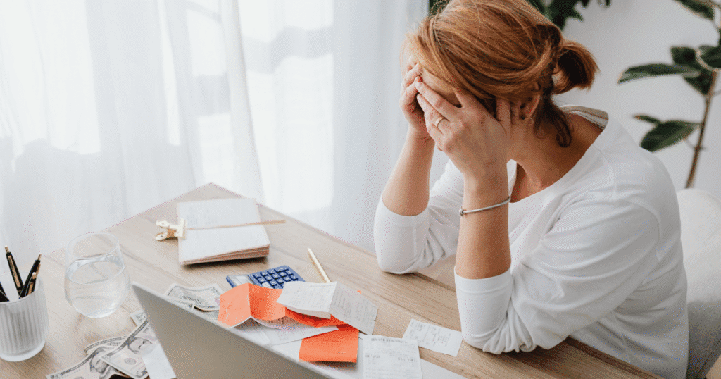 Small business owner reviewing allowable expenses for tax savings.